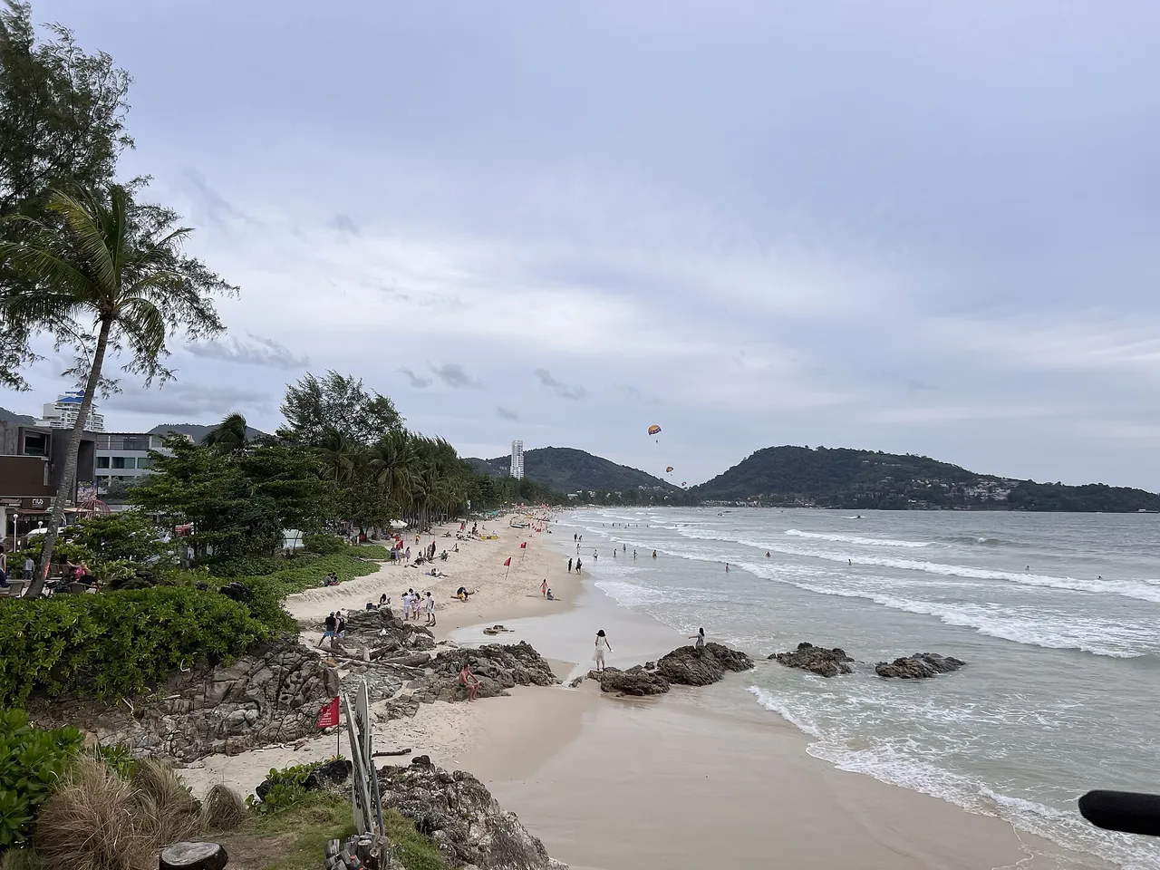 Patong Beach coastline with people and watersports